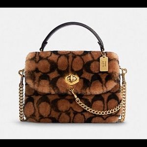 Like New Coach X Jennifer Lopez Marlie Top Handle Satchel In Signature Shearling